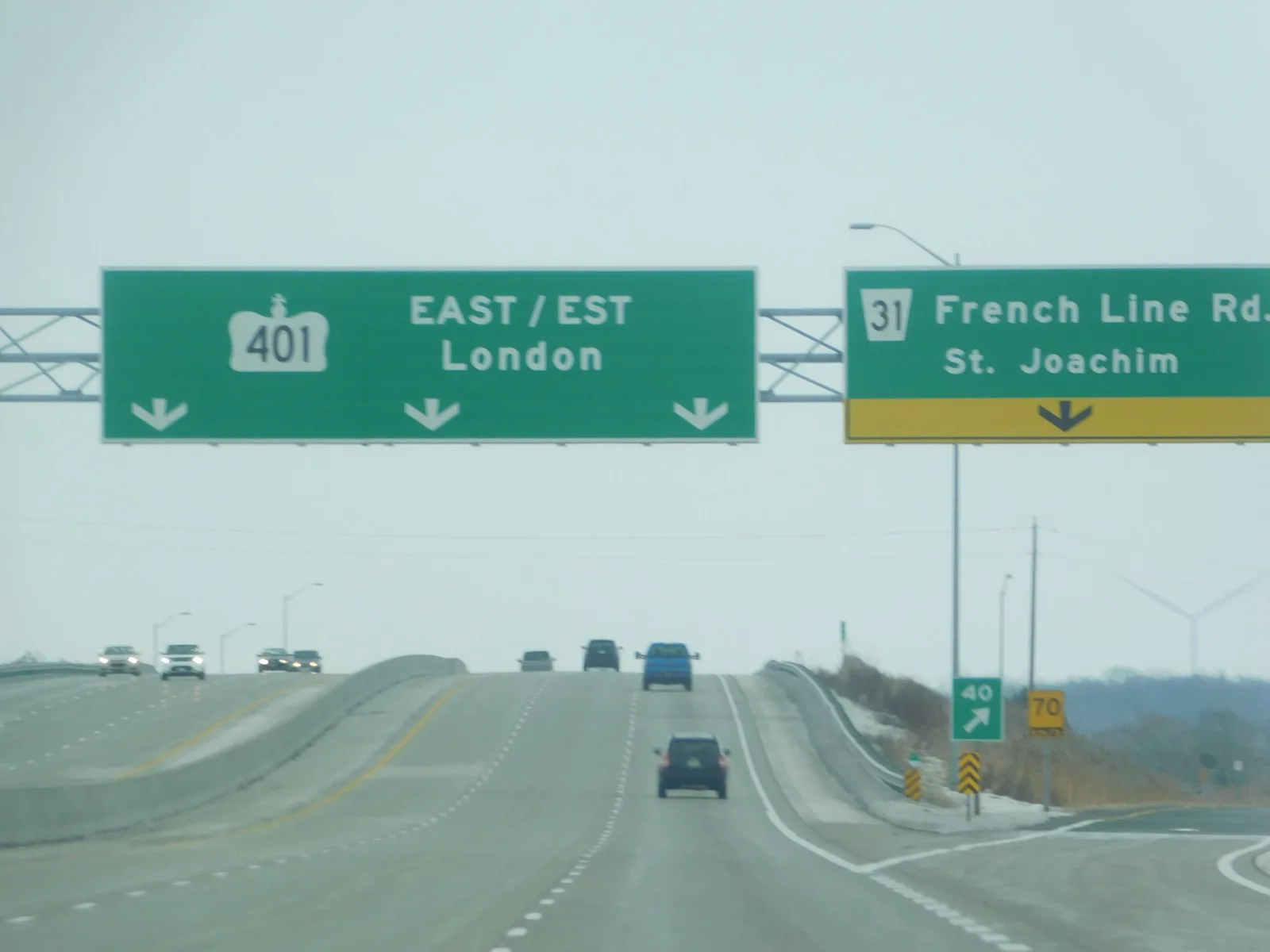 Overhead 400-series highway signage on an Ontario freeway