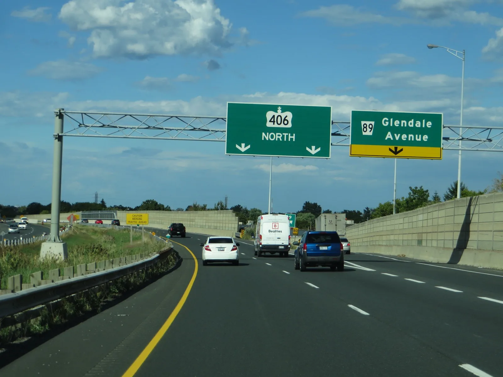 Overhead directional signage on an Ontario 400-series highway