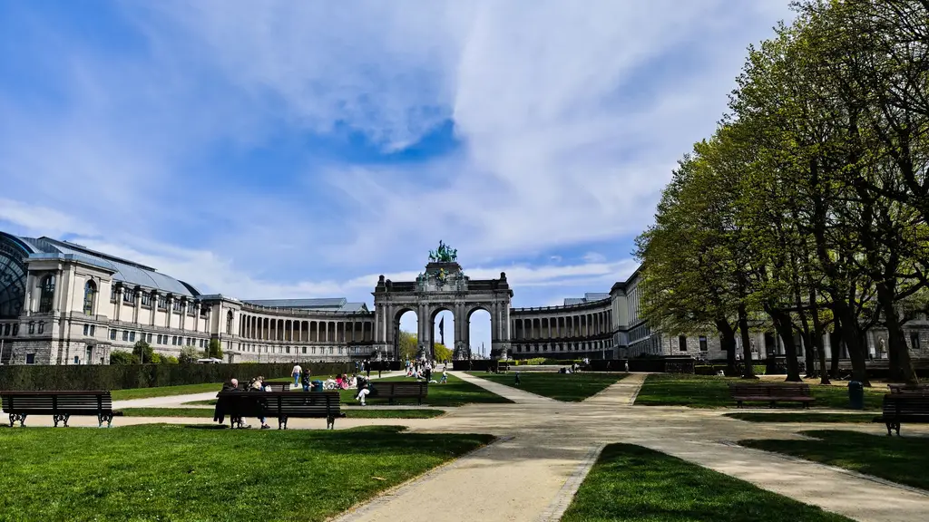Beautiful spring day at Cinquantenaire Park with the iconic Triumphal Arch in Brussels, Belgium.