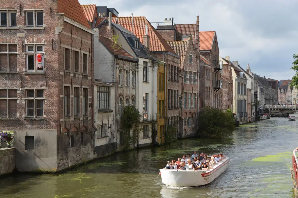 Explore historic architecture and canal views on a boat tour in Ghent, Belgium.