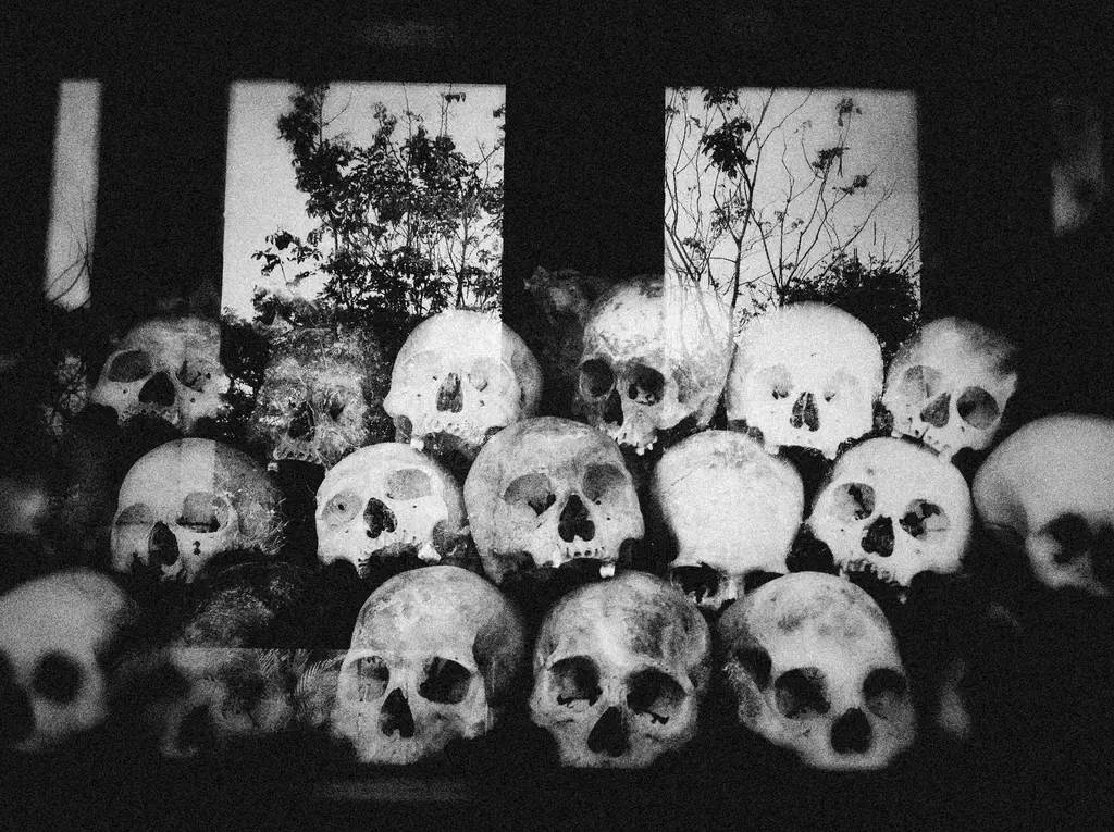 Chilling monochrome image of skulls from Cambodia's past in Phnom Penh.