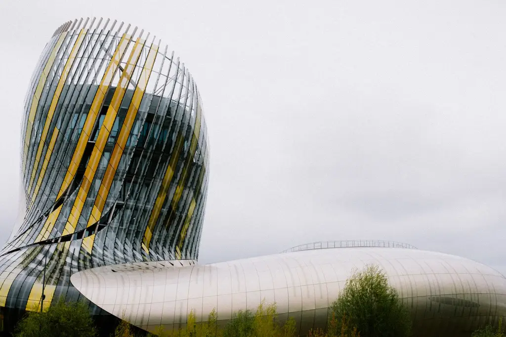 Explore the iconic La Cité du Vin museum in Bordeaux, France, showcasing modern architectural design.