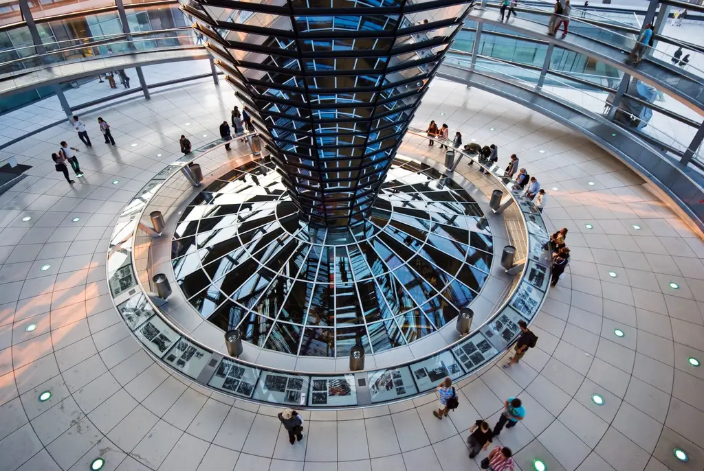 Explore the striking interior of the Reichstag Dome in Berlin, Germany, showcasing modern architectural design.