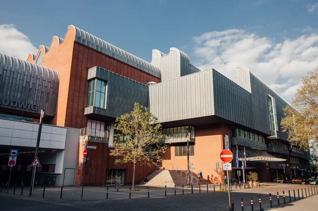 Exterior view of the modern Museum Ludwig in Cologne, showcasing unique architectural design.