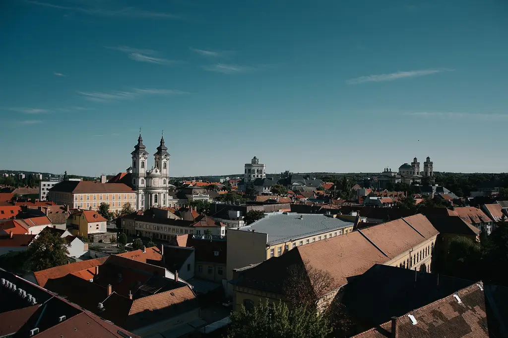 Elegant aerial view showcasing the historic architecture of Eger city with the twin towers of the Basilica in Hungary.