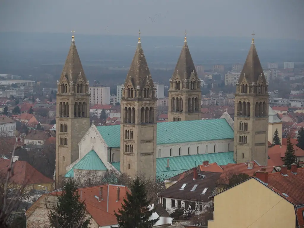 Aerial view of the historic Cathedral of Pécs with its iconic four towers in Hungary.