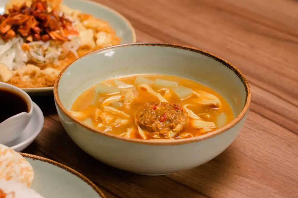 Delicious bowl of Indonesian Soto soup, perfect for showcasing authentic Asian cuisine.