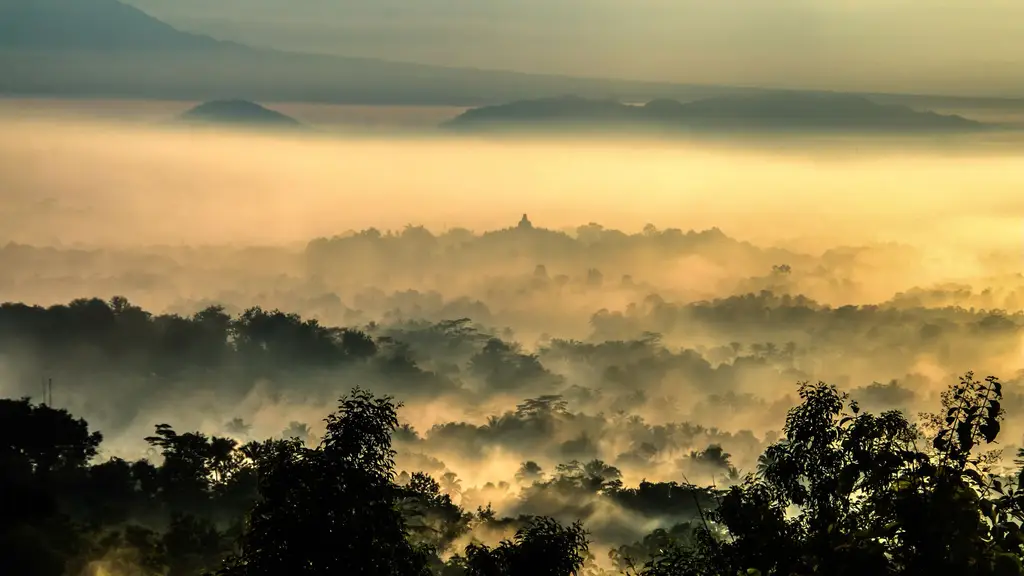 A breathtaking view of misty sunrise over Borobudur Temple in Jogja, Indonesia.