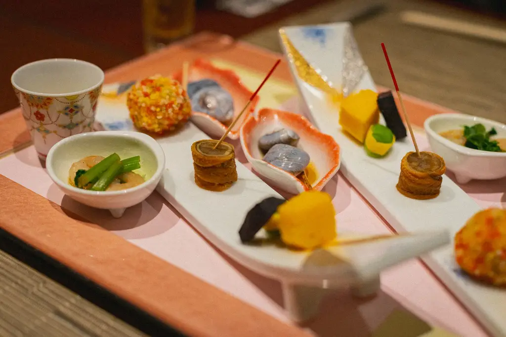 Exquisite Japanese Kaiseki dishes beautifully arranged, showcasing gourmet culinary artistry in Kamogawa, Chiba.