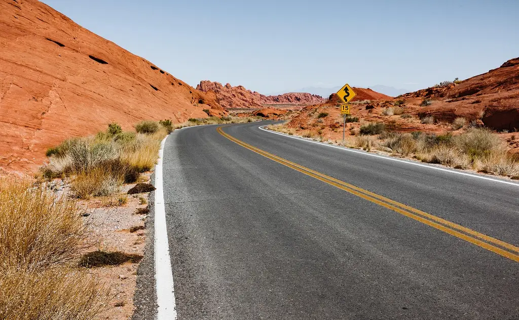 desert, road, badlands, barren, barren landscape, street, curved road, arid, asphalt, dry, highway, landscape, outdoors, travel, nature, road, road, street, asphalt, highway, highway, highway, highway, highway