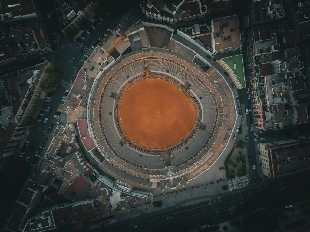 Stunning aerial image of Seville's historical bullring, capturing the vibrant architecture.