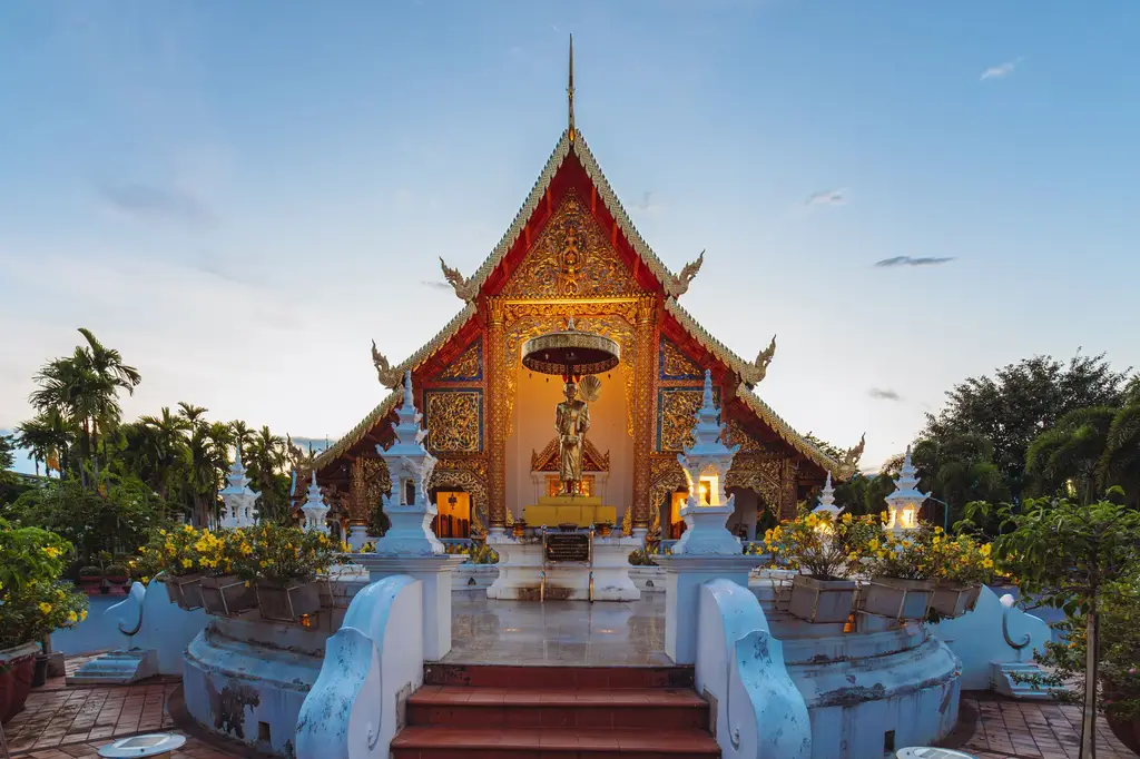 Stunning view of Wat Phra Singh Temple in Chiang Mai, Thailand during twilight.