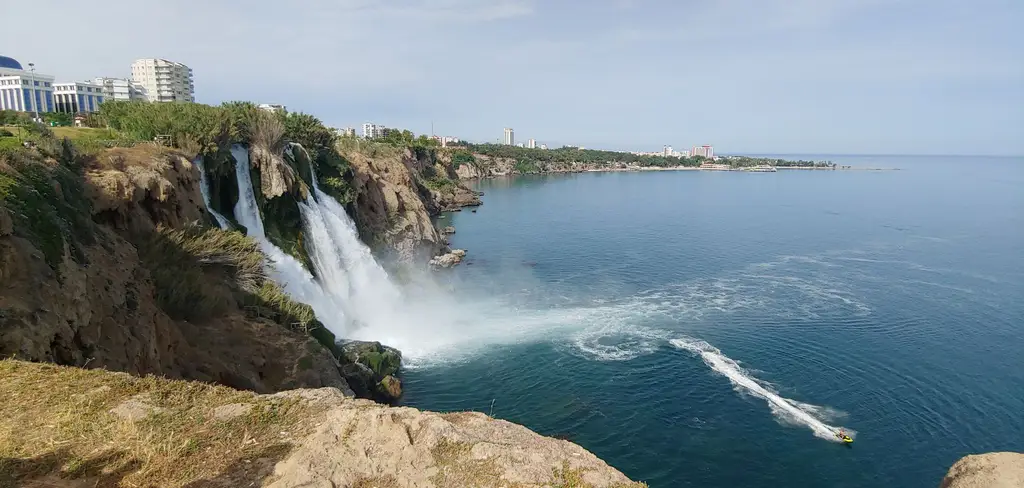 Stunning view of Düden Waterfall cascading into the Mediterranean in Antalya, Turkey.
