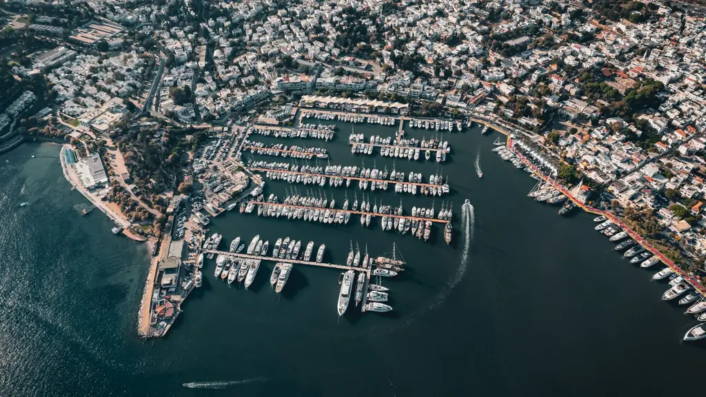 Stunning aerial view of a bustling marina with boats in Bodrum, Muğla, Turkey.