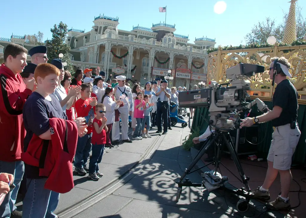 US Navy 051204-N-8102J-004 Members of the Armed Forces and their families participate in the taping of the 2005 Walt Disney World Christmas Day Parade held at the Magic Kingdom in Orlando, Fla